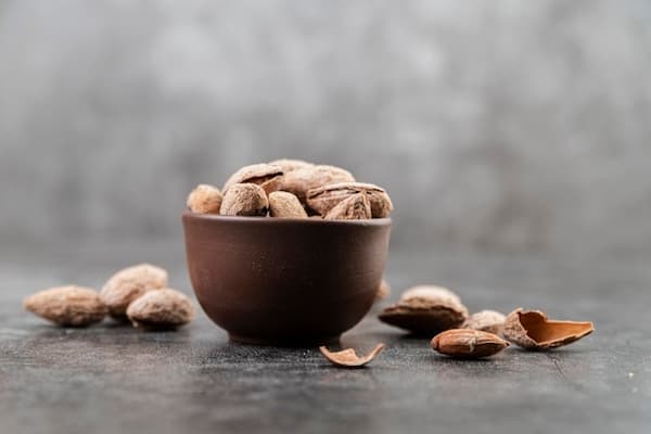 قیمت خرید بادام منقا خام با فروش عمده